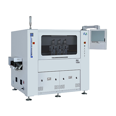 Pin insertion for coiled materials